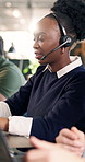 Typing, support and woman with headset in agency for customer service or online advice in office. Contact us, coworking or agents with chat for virtual assistance, CRM or communication in call center