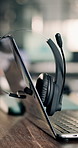 Empty, business and headset at call center with laptop, contact us and customer service for crm. Help desk, mic and online in office with pc, virtual assistance and telecom advisory for tech support