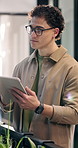 Thinking, business and man in office with tablet, research and email source to confirm facts. Thoughts, male person and reading in workplace with digital, proofreading and story draft for publication