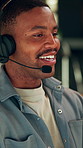 Talking, happy and man with headset for customer support, contact us and virtual assistance. Business, night and African person with mic for online consulting, crm service and communication in home
