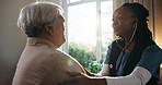 Caregiver, stethoscope and old woman in home for healthcare, breathing assessment and heartbeat. Medical, cardiology and test lungs of person, pulmonary exam or retirement homecare with happy nurse