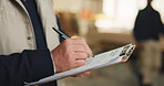 Writing, hands and carpenter for woodwork with clipboard, inspection and material for timber production. Warehouse, man and person with checklist for inventory, lumber business and furniture order