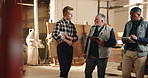 Carpenter, team and planning with clipboard for manufacturing, furniture design or inspection. Production, woodwork or walking with men in factory for joinery project, tablet or quality control