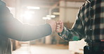 Carpentry, team or hands in warehouse with handshake, support and motivation for furniture project. Flare, people and engineers with fist bump, encouragement and solidarity in woodworking workshop.
