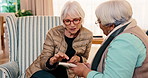 Book, high five and senior friends on sofa in home for bonding, connection and weekend break. Happy, writing and elderly women in living room with solving sudoku puzzle together in apartment.