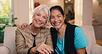 Comfort, face and nurse with senior woman in home with bonding, connection or medical support. Smile, hug and portrait of caregiver with elderly person in retirement for healthcare checkup in house.