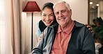 Hug, face and nurse with senior man in home with bonding, connection or medical support. Smile, comfort and portrait of caregiver with elderly person in retirement for healthcare checkup in house.