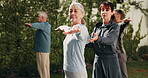Senior woman, stretching and fitness class in backyard, physical activity and smile with instructor. Outdoor, personal trainer and workout routine with mature people, warm up and wellness at house