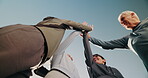 Below, fitness and high five with mature people outdoor together for support or teamwork. Blue sky, health and success with group of happy friends in huddle for celebration, goals or milestone