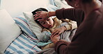 Woman, bedroom and sick child with touch for fever, flu or high temperature with help in family home. Boy kid, ill son and mother with support for wellness, recovery or healing with concern or worry