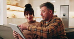 Tablet, talking and excited couple on home sofa with internet connection, discussion and bonding. Mature man, woman and tech on living room couch for good news, mobile app or hug to celebrate success