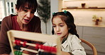 Mother, daughter and education in home with abacus, discussion and practice math for child development. Woman, talk and kid in house with counting tool, learning and assistance for knowledge growth.