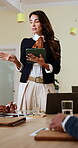 Business woman, tablet and discussion in office, team meeting or presentation brief with online tasks. Mature leader, talk and technology for pitch, digital agenda and productivity in collaboration