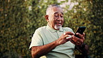 Smile, old man and relax in backyard with phone, social media and browsing website for bingo. Happy, senior person and laughing at house with mobile, internet search and download games for retirement