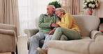Senior couple, hug and talking in home with love, care or discussion together in happy marriage in living room. Elderly man, old woman and chat or conversation for retirement, relax and embrace