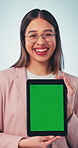 Green screen, laughing and tablet with woman face in studio for advertising or marketing opportunity. Display, mockup space and tech with happy person on white background for digital information