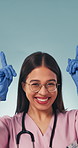 Nurse, face and happy woman in studio, pointing and presentation for healthcare services and advice. Blue background, space and person with smile, dancing and medical professional with health options