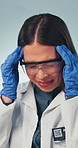 Scientist, woman or headache in studio with stress, experiment fail or funding loss. Science professional, person or migraine for medical mistake, research pressure or burnout with pain on background