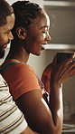 Happy, couple and hug in home with coffee, relationship commitment and love for bonding together. Black people, dating and smile in kitchen with romantic partner, embrace and warm drink for morning.