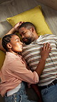 Sleeping, relax and black couple on floor in home with bonding, love and connection in marriage. Rest, afternoon nap and man with woman for chilling on ground on weekend in living room at house.