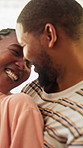 Happy, couple and love in home with connection, bonding together and care for relationship commitment. Black people, dating and smile in apartment with romantic partner, loyalty and relax on weekend.