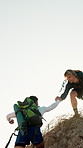 Climbing, help and men on mountain for hiking, adventure and trekking for tourism on holiday. Hands, nature and friends with assistance for travel, explore and backpacking outdoor for hobby together