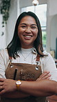 Salon, face or asian woman with confidence for grooming, cosmetics or treatment in barbershop. Portrait, female person or hairdresser with smile or arms crossed for hair styling service in parlor