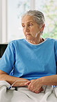 Thinking, sick and old woman at hospital with stress, vision and concern for medical recovery. Senior person, icu and reflection with emotional distress, chronic illness and healthcare rehabilitation