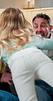 Child, jumping and parents at house with hug, love and parental care for bonding together. Excited, mature man and embrace in home with playful kid, affection and family connection for weekend break