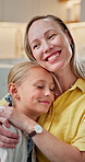 Home, mother and hug child for bonding together, love and smile with connection on weekend. Happy family, parent and embrace girl with care in lounge for support, security and trust with daughter