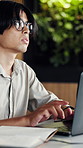 Laptop, thinking and business man in office for project proposal, email marketing or typing. Computer, inspiration and Asian person at work for advertising report, review or idea for campaign update