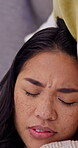 Woman, sleeping and tired on sofa with fall down to relax in home living room, exhausted and bored. Insomnia, rest on couch and fatigue with female person in lounge with dreaming, lazy and snooze