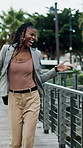 Happy, dancing and black woman with bag in city for job opportunity, vibe or celebration. Excited, female person and walking with smile, movement or positive attitude for good energy in an urban town