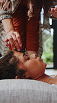 Meditation, crystal and woman with healer, peace or chakra balance for aura restoration. Stone, relax and person with holistic alignment ritual, hand and alternative medicine at wellness center