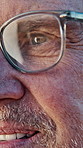 Optometry, closeup and senior man with glasses for vision, eyesight and prescription lens. Thinking, ophthalmology and person with frames, spectacles and eye care for optical wellness or healthcare