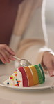 Dance, hands and woman with cake for celebration, happy or excited for eating treat on special day. Slice, smile and person with rainbow dessert for birthday, sweet snack and confectionery in home