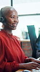 Happy, typing and woman in office with headset for virtual assistance, customer support or online help. Business, call center and African person for consulting, crm service and advice for contact us