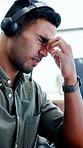 Telemarketing, man and headache in office with computer, lead generation stress and burnout from job. Frustrated, person and tired consultant in business with pc, migraine and fail for sales agent.