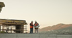 Blueprint, teamwork and talking with men on construction site for meeting or planning. Building, collaboration and conversation with engineering people on worksite together for project management