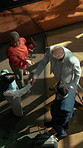 Above, handshake and meeting with business group in hotel lobby for collaboration or welcome. B2B, hospitality and teamwork with employee people shaking hands in foyer for accommodation or travel