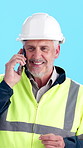 Phone call, man and construction worker in studio with communication, contact or feedback on project. Tech, happy and mature manager on mobile discussion for review on building by blue background.