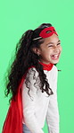 Girl, superhero or laughing with cosplay on green screen for funny role play on a studio background. Child, kid or humor with smile in hero costume for comedy, dress up or playful entertainment