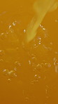Orange juice, splash and pour for health, wellness and nutrition with organic beverage from above. Citrus liquid, diet and flow with natural benefits, hydration and vitamin c with antioxidants