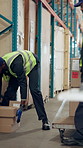 Men, packing or boxes on trolley in warehouse for distribution, shipping or inventory management. People, team and loading package for logistics, industrial stock and inspection for quality assurance