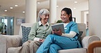 Advice, tablet and nurse with old woman on sofa in home for consulting, medical app and help. Caregiver, support and healthcare review with people in living room for healing and online checklist