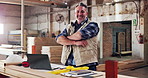 Face, carpenter and arms crossed in workshop for manufacturing, trade and laptop with career pride. Male person, mature and carpentry with tools for production, lumber factory and happy in profession