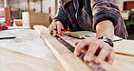 Carpentry, hands and pencil with man in workshop for production or manufacturing process. Marking, measure and precision with professional in woodworking factory for furniture business or industry