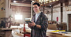 Face, carpenter and tablet in factory with man, manufacturing and online blueprint plans for trade. Happy person, pride and carpentry with tech, production and lumber workshop website for about us