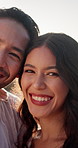 Laugh, hug and face of couple outdoor on holiday for anniversary, bonding or commitment in marriage. Happy, flare and portrait of man embracing woman for connection in relationship on vacation.
