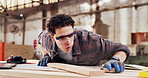 Sanding, carpenter and dust with plank in workshop for project, planning and manufacture furniture. Warehouse, sandpaper and person with equipment, timber material and small business in factory
